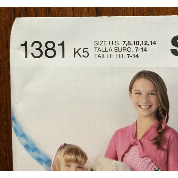 UNCUT Simplicity Pattern 1381 Girls SUEDE SAYS Dress, Romper Cardigan. Sz 7-14 - Picture 2 of 3